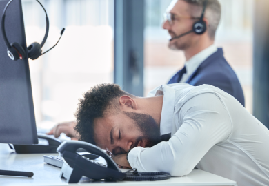 Employee asleep at desk
