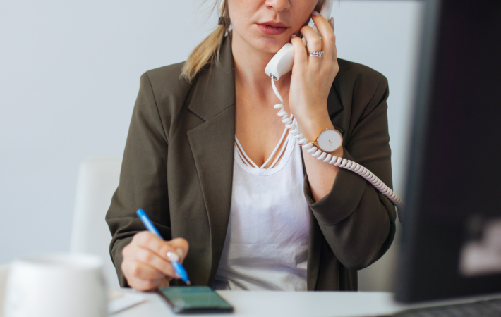 Woman looking concerned on phone